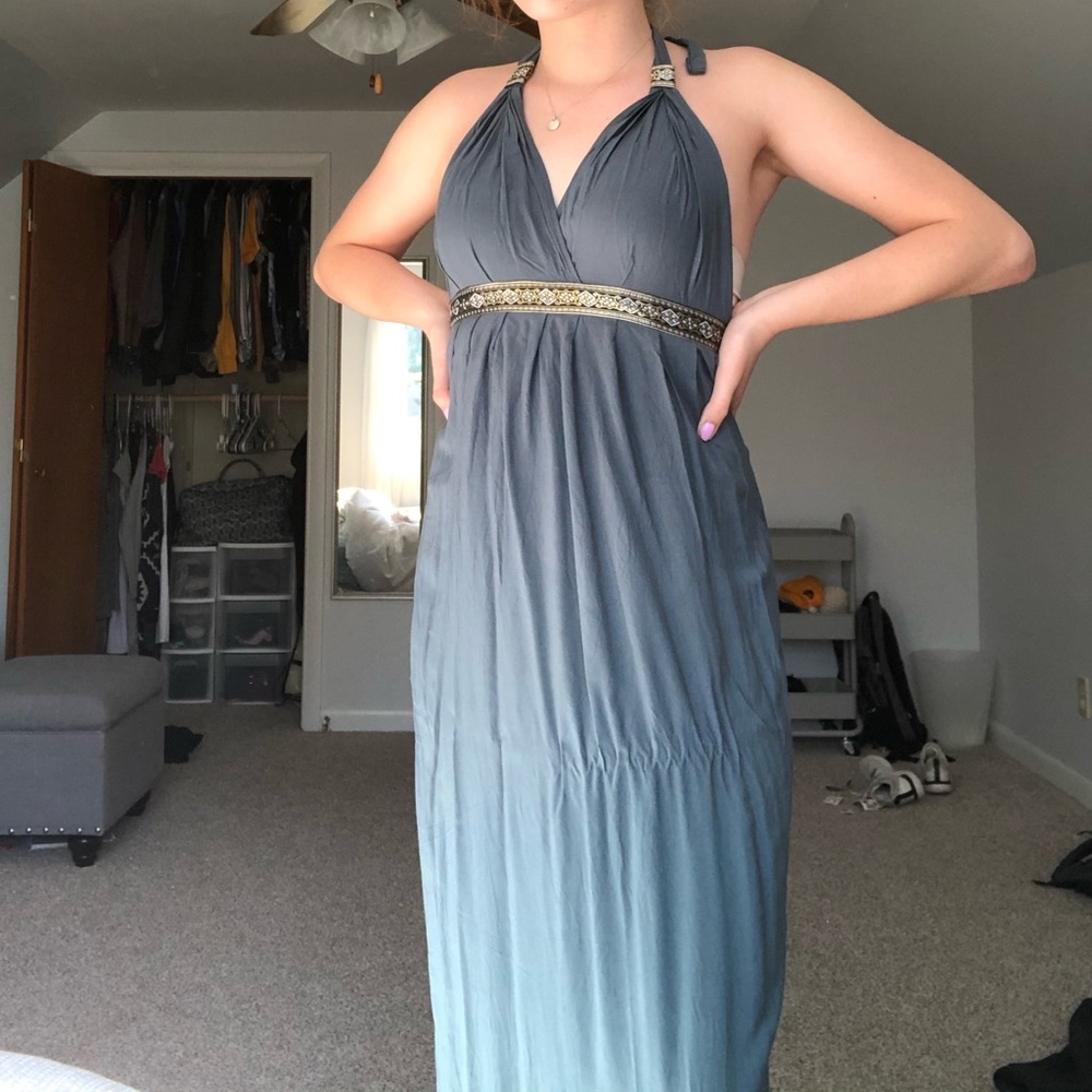 Long dress with gold, black, and white belt